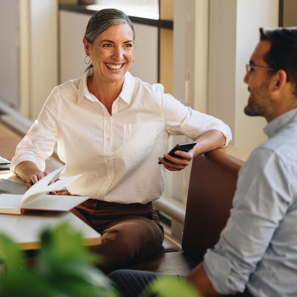 two people collaborating at work